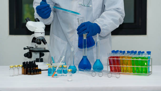 istock Researchers, doctors, scientists work with plastic medical tubes in modern laboratories or hospitals. Biotechnology Expert On Advanced Equipment Chemistry Lab Medicine Experiment For Hospital 1376071612