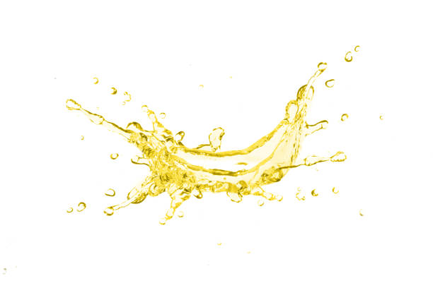 Cooking oil splashing isolated on white Cooking oil splashing isolated on white background. apple juice photos stock pictures, royalty-free photos & images