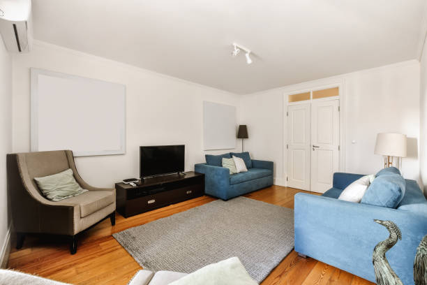 istock Luxurious living room design with blue sofa 1376083058