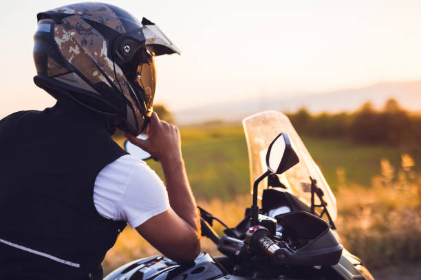 istock Motorcyclist enjoys sunset 1376090877