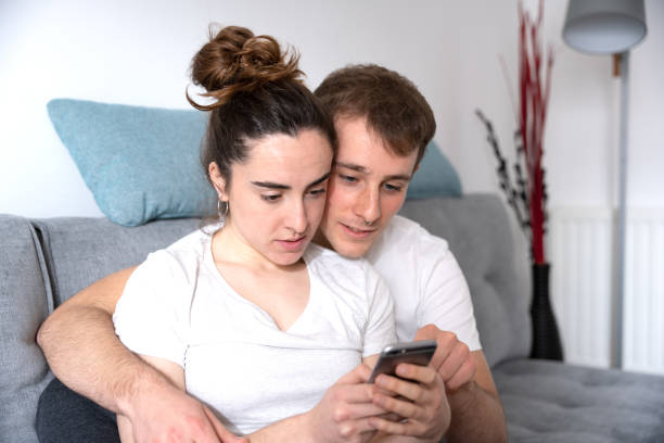 istock Romantic couple on social media 1376091001