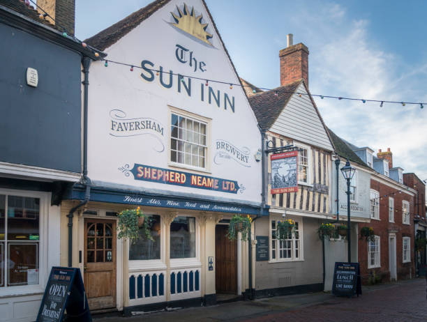 Facade of The Sun Inn public house in the medieval market town of Faversham, Kent, UK