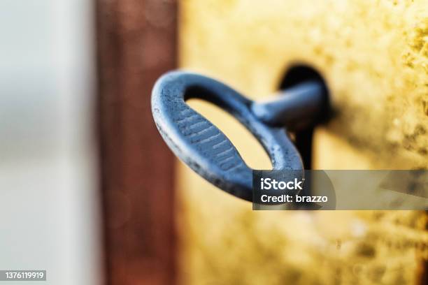 Key In Keyhole Stock Photo - Download Image Now - Key, Hole, Old