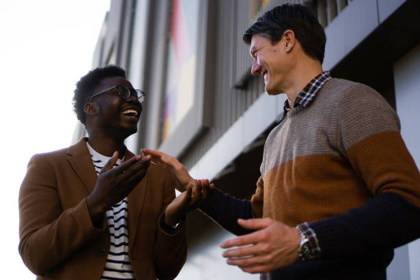 istock Two Casual businessmen talking outside 1376123194