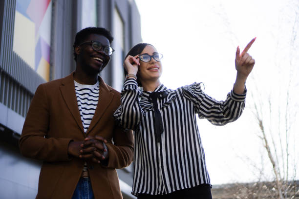 istock Two young colleagues looking at distance 1376123945