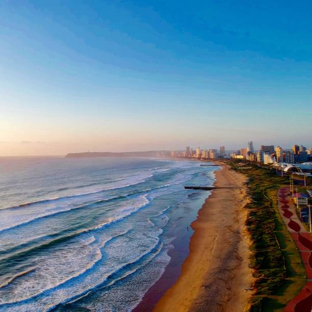 Durban Promenade Sunrise over the Durban coastline zululand stock pictures, royalty-free photos & images