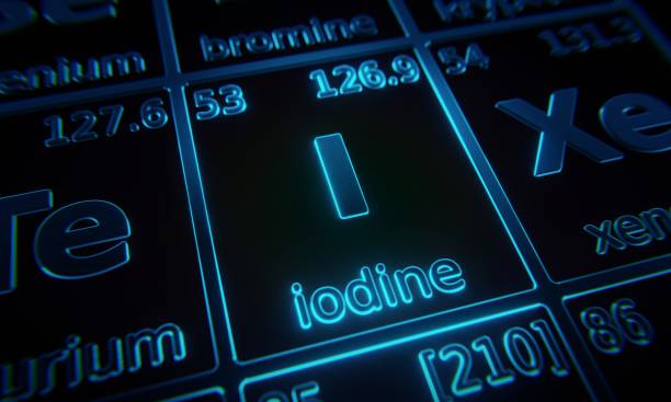 istock Focus on chemical element Iodine illuminated in periodic table of elements. 3D rendering 1376146200