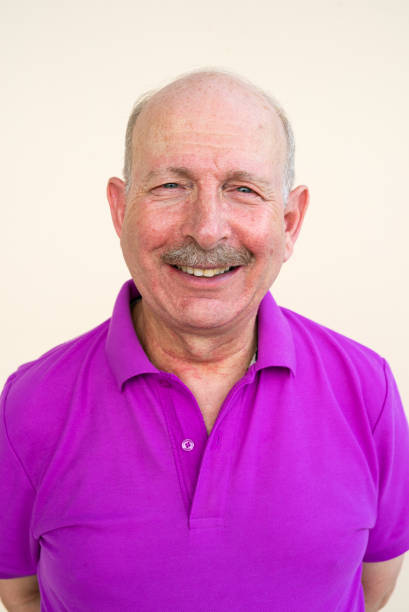 istock Portrait of senior man looking at camera while smiling 1376146887