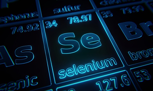 Focus on chemical element Selenium illuminated in periodic table of elements. 3D rendering