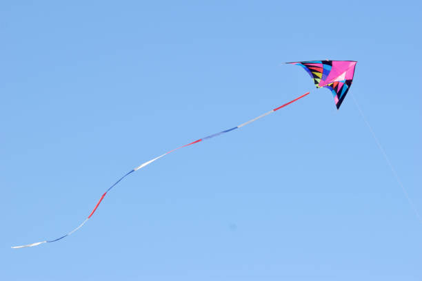 istock Colorful Kite flying on blue sky 1376165140