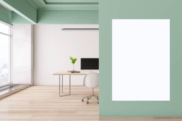 istock Modern concrete office interior with wooden flooring, empty white mock up poster, panoramic city view, desktop with computer and daylight. 3D Rendering. 1376197448