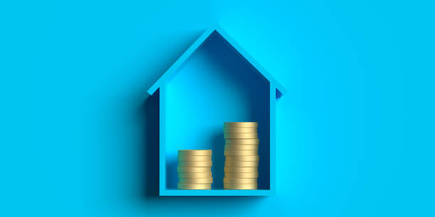 modèle de maison bleue et pile de pièces d’or pour l’investissement hypothécaire - loan reversing finance currency photos et images de collection