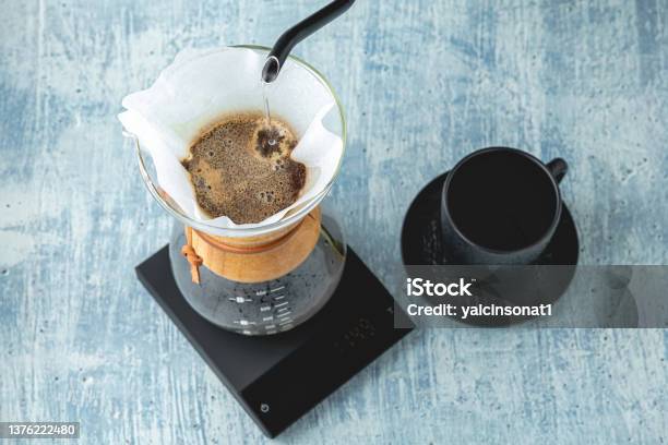 Professional Barista Brews Coffee Using Chemex Alternative Ways To Brew Coffee Coffee Shop Concept Stock Photo - Download Image Now
