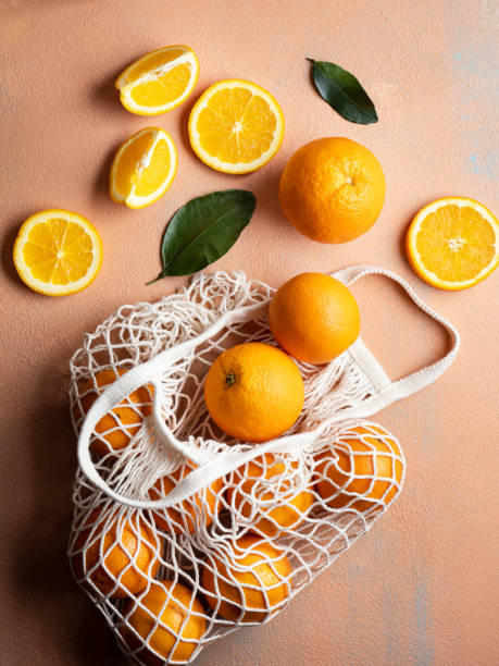 Oranges in reusable bag,  Fresh Slice Orange, Orange stock photo
