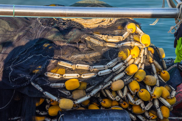istock A fishing net with ropes and cord on the deck 1376250026