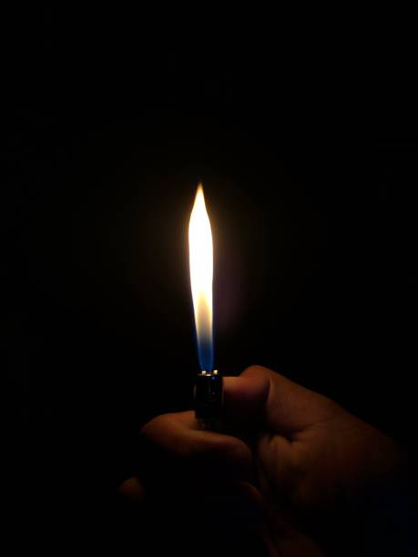 istock photo of a fire lit from a gas lighter 1376260803