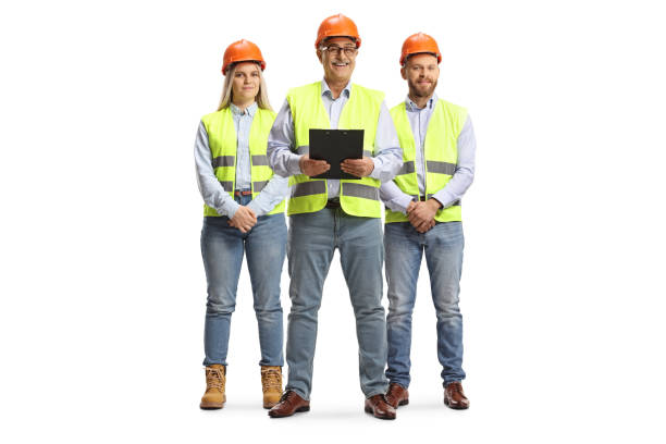 istock Team of engineers wearing reflective vests amd helmets 1376283213