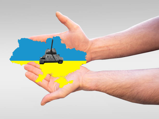 istock Hands with Ukraine Map and Tank Symbolic 1376289225
