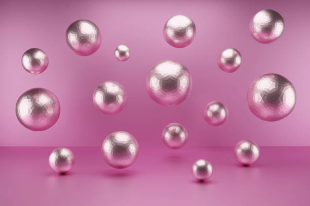 Abstract silver colored balls and spheres on the pastel colored background