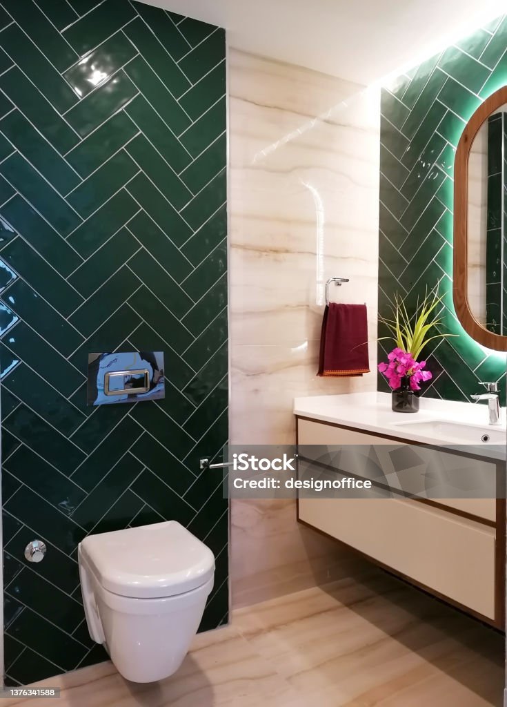 modern bathroom design green tile and beige marble Vanity Mirror Stock Photo