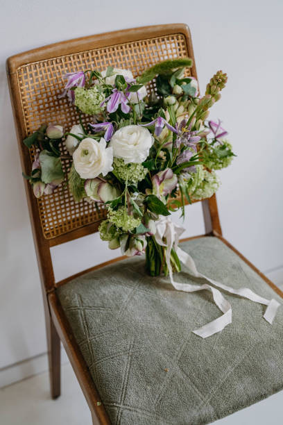 istock spring bridal bouquet on retro chair 1376342129