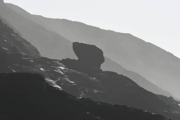 istock Silhouetted rock on the cliffs of Tregardock Beach North Cornish Coast 1376346495