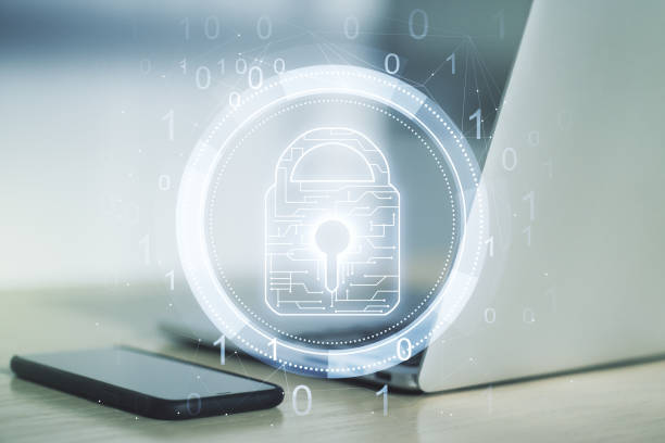 istock Double exposure of creative lock hologram with chip on laptop background. Information security concept 1376359458
