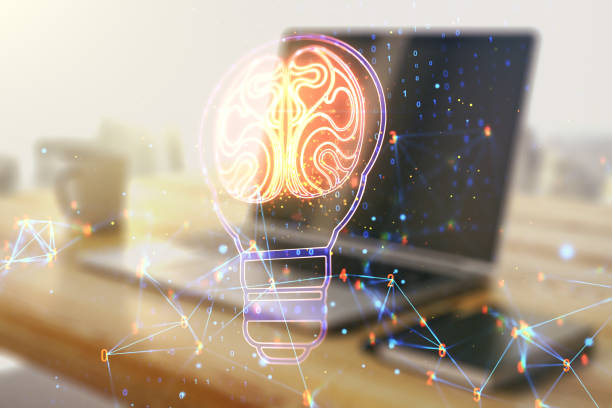 istock Creative light bulb illustration with human brain and modern desktop with pc on background, future technology concept. Multiexposure 1376360658
