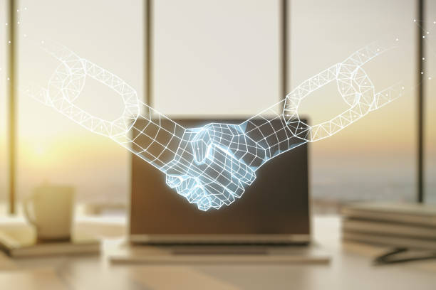 Double exposure of blockchain technology with handshake hologram on laptop background. Research and development decentralization software concept stock photo