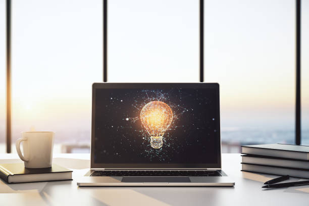 istock Modern computer monitor with creative light bulb hologram, research and development concept. 3D Rendering 1376361707