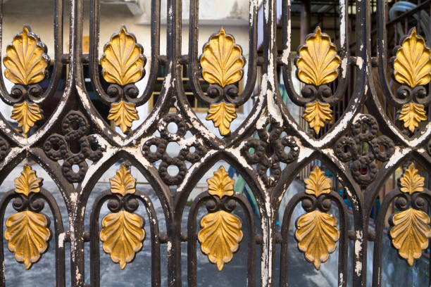 istock Black and golden colored ornated gate in Bangkok 1376392154