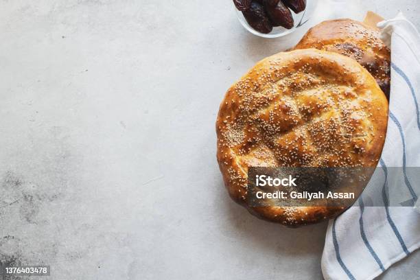 Ramadan Pide Turkish Popular Bread For Ramadan Month On A Gray Background Cop Cpase And Top View Stock Photo - Download Image Now