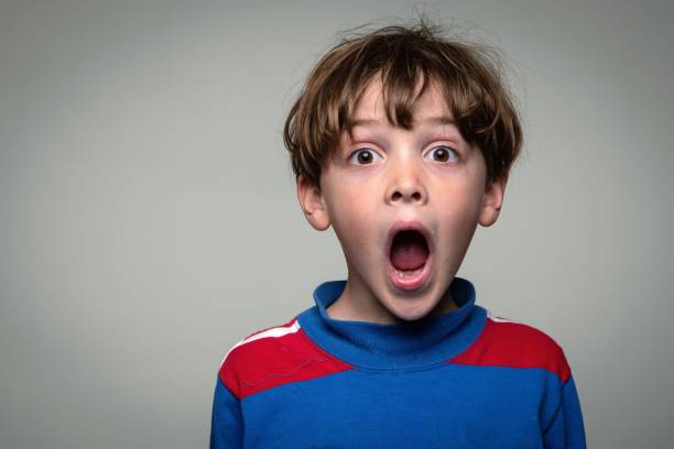 istock Surprised little boy looking at the camera 1376404851