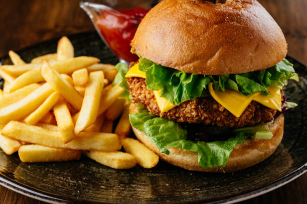 istock beef burger on a plate with potatoes and sauce 1376405454
