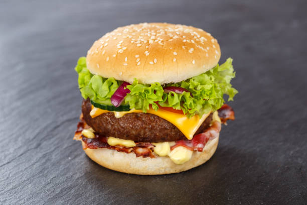 istock Hamburger Cheeseburger fastfood fast food on a slate 1376416472