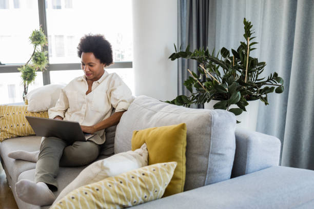istock Woman using laptop and relaxing 1376494112