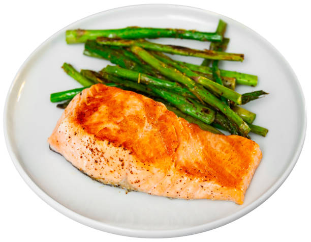 istock Grilled salmon filet with asparagus on plate 1376516973