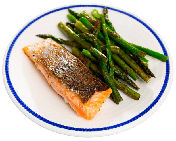 istock Sliced tasty salmon with asparagus 1376516979