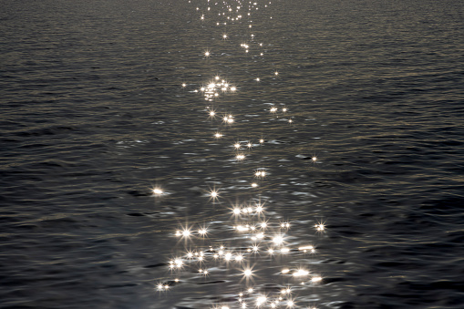 Specular light reflected from the ocean surface.