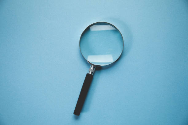 istock magnifying glass on the blue background 1376521547