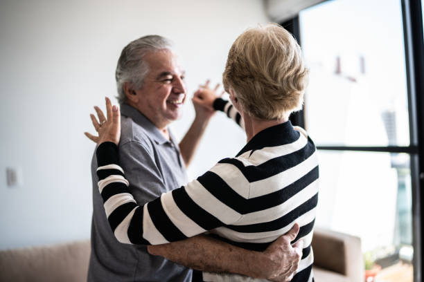istock Senior couple waltzing at home 1376521860