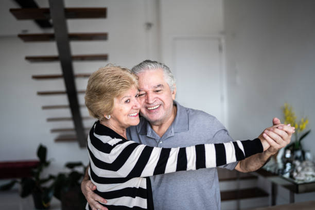 istock Senior couple waltzing at home 1376522033