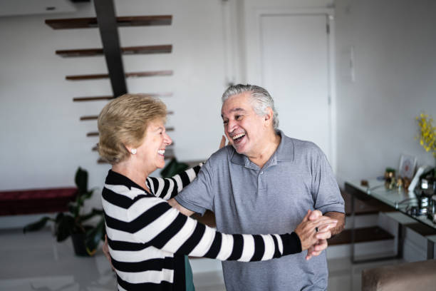 istock Senior couple waltzing at home 1376522035