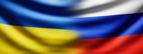 ウクライナとロシアは対立する。ウクライナとロシアの国旗は、緊張、危機、攻撃された国境、キューとモスクワの間の戦争を描いています。 - armed forces kyiv ukraine eastern europe ストックフォトと画像