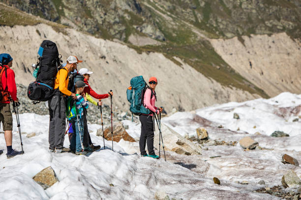istock Family Trekking in mountains 1376529634