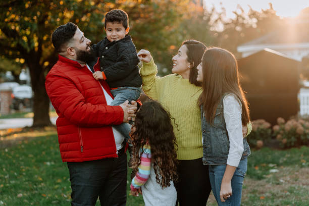 istock Latin family together outdoors during autumn 1376536364