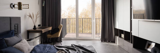 istock Spacious bedroom with desk, panorama 1376585583