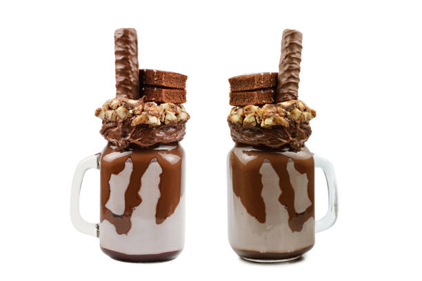 istock Chocolate extreme milkshake with brownie cake, chocolate paste and sweets. Crazy freakshake food trend. Copy space 1376597775
