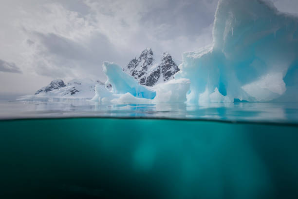 istock Under and over water view of an iceberg. 1376602084