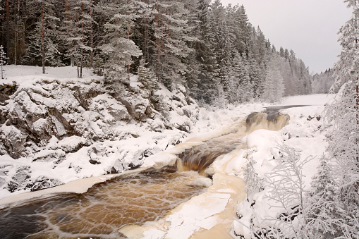 The pearl of Karelia Republic- Kivach waterfall at winter season